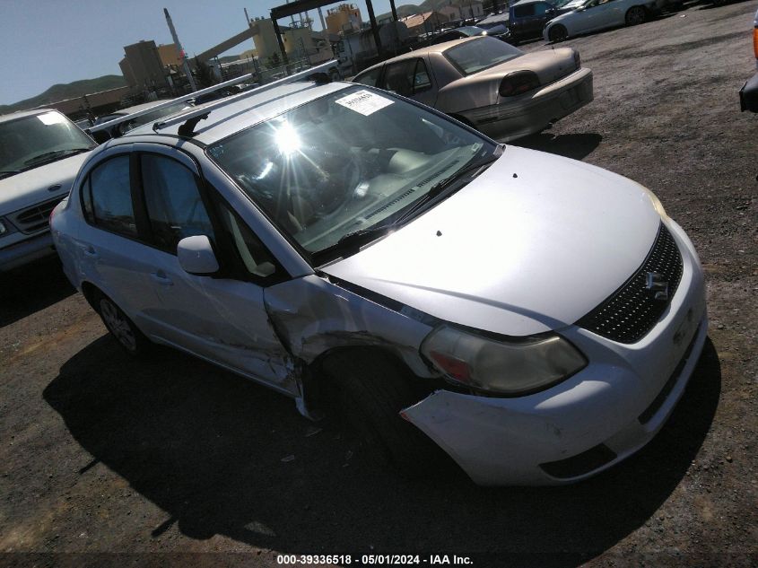 2011 SUZUKI SX4 LE/LE ANNIVERSARY EDITION